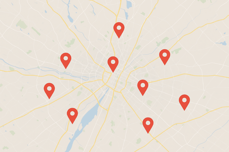 Carte de ville avec des marqueurs de position pour illustrer le suivi du référencement local par zone géographique